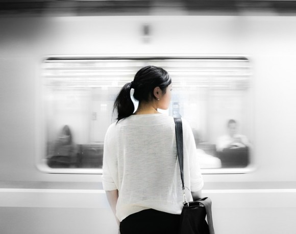 Chinese Girl Taking The Subway